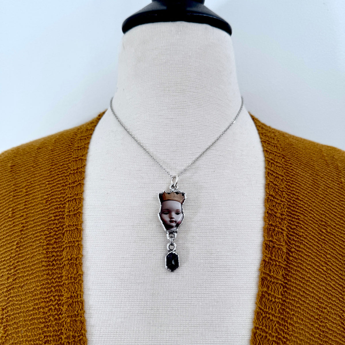 doll head necklace, garnet, fine silver