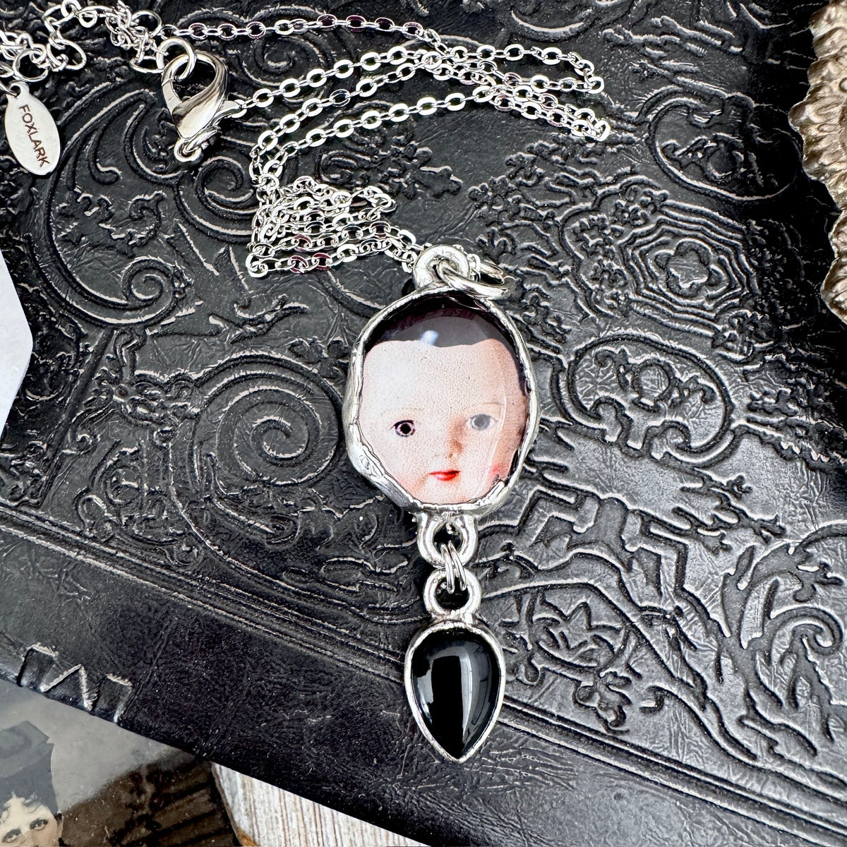 doll head necklace, obsidian, fine silver