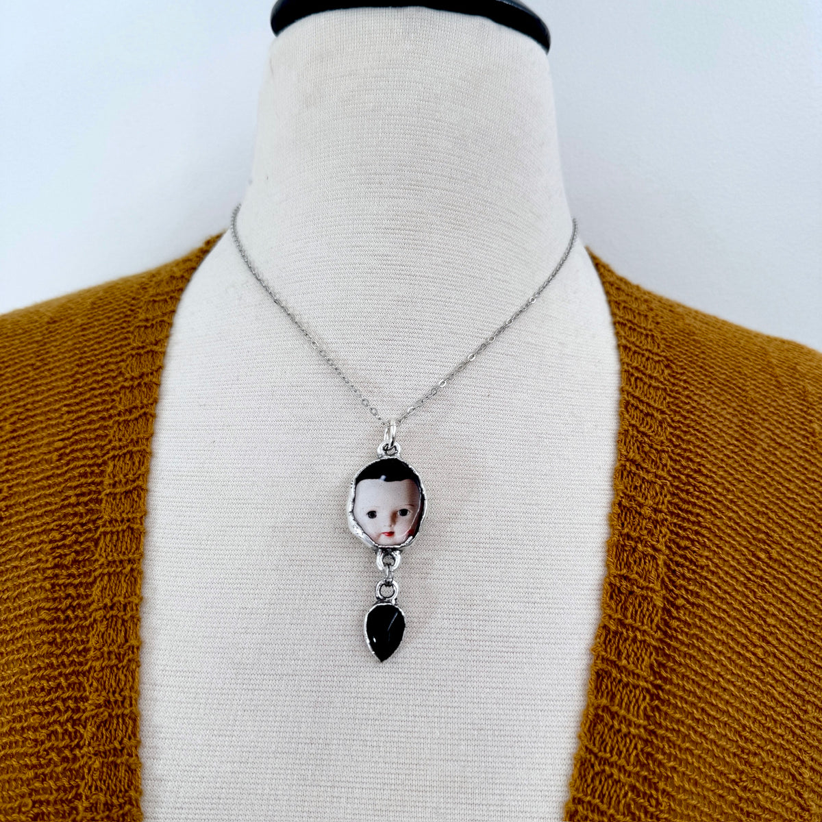 doll head necklace, obsidian, fine silver