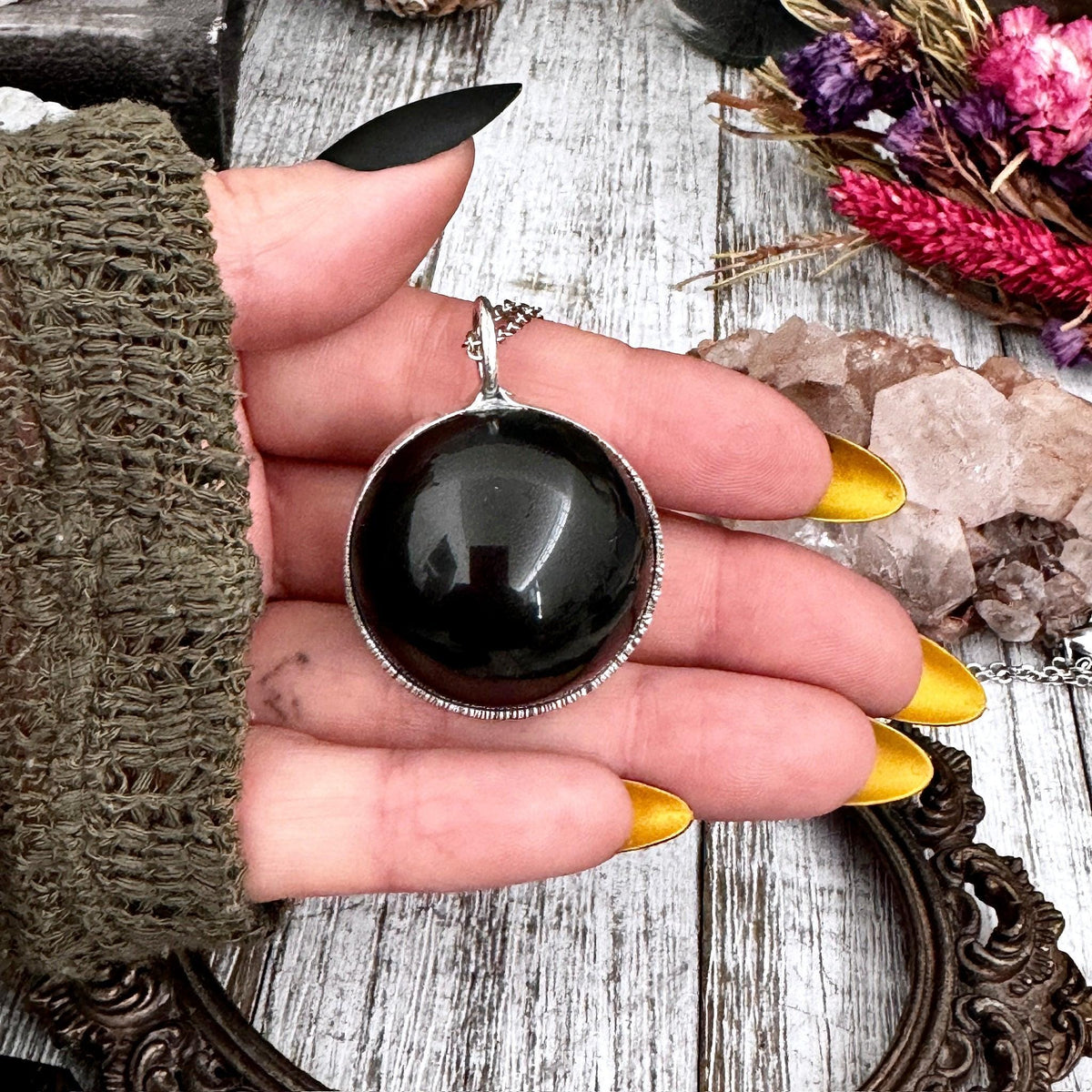 Black obsidian crystal ball necklace in silver, featuring a sleek design from FOXLARK NECKLACES in the Foxlark Collection.