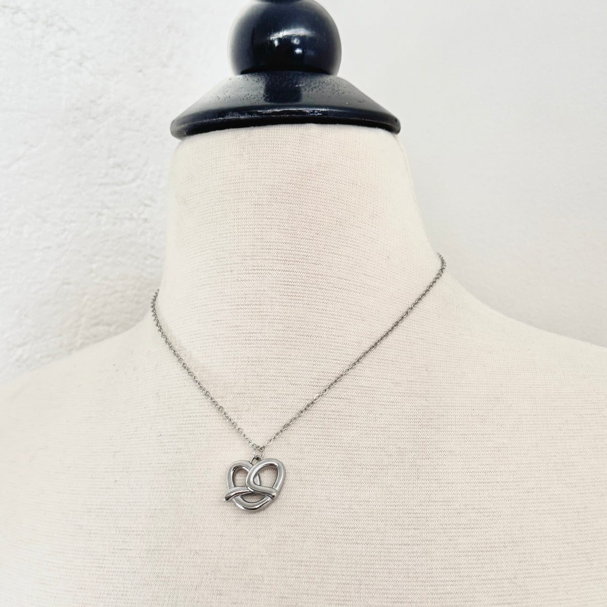 Pretzel Charm stainless steel pendant necklace from the Lucky Charm Bar at Foxlark