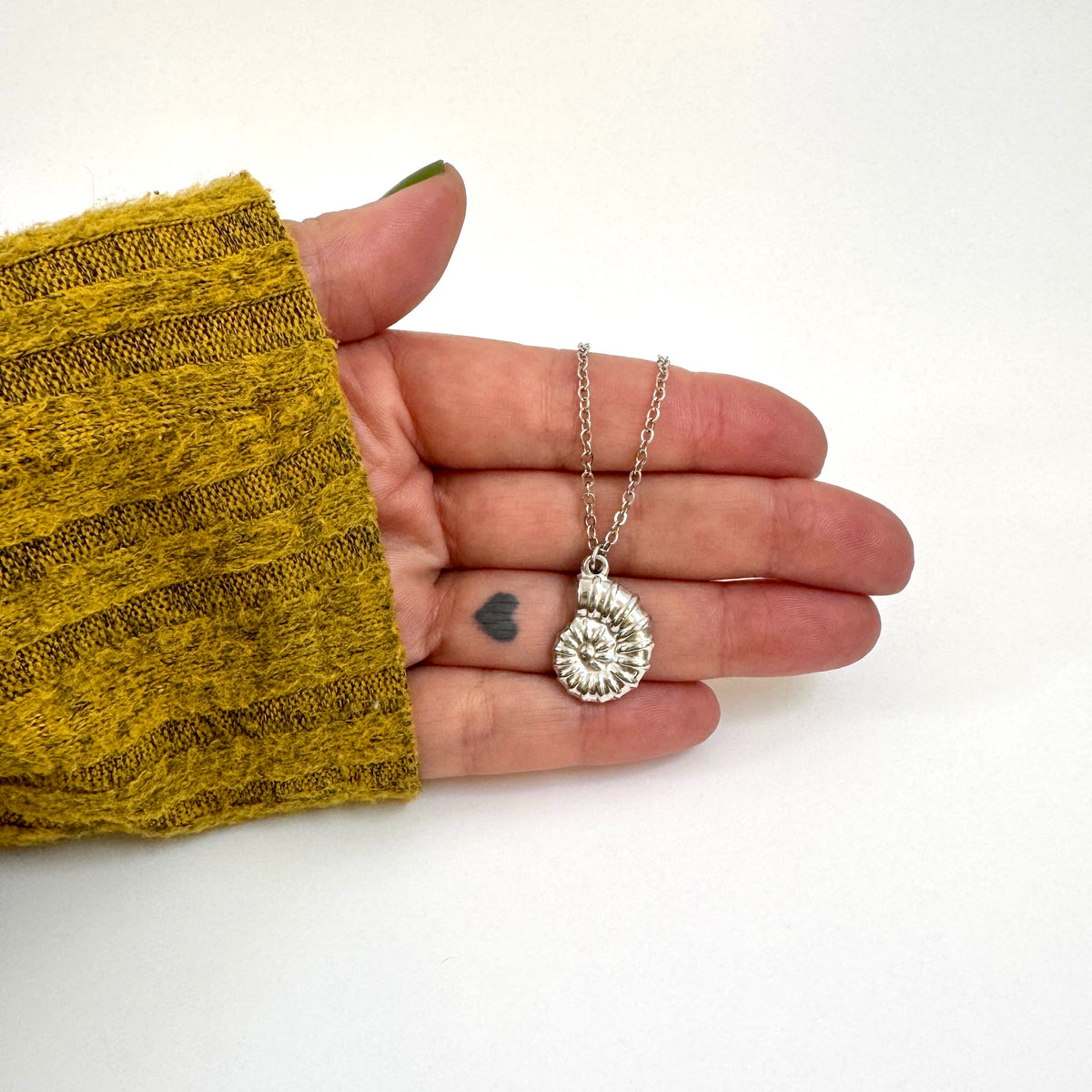 Nautilus Shell Charm stainless steel pendant necklace from the Lucky Charm Bar at Foxlark