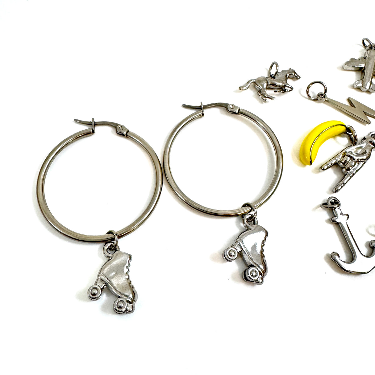 The Everyday Charm Collector Hoop Earrings - Round Tube Stainless Steel Earring Hoops from the Lucky Charm Bar by Foxlark