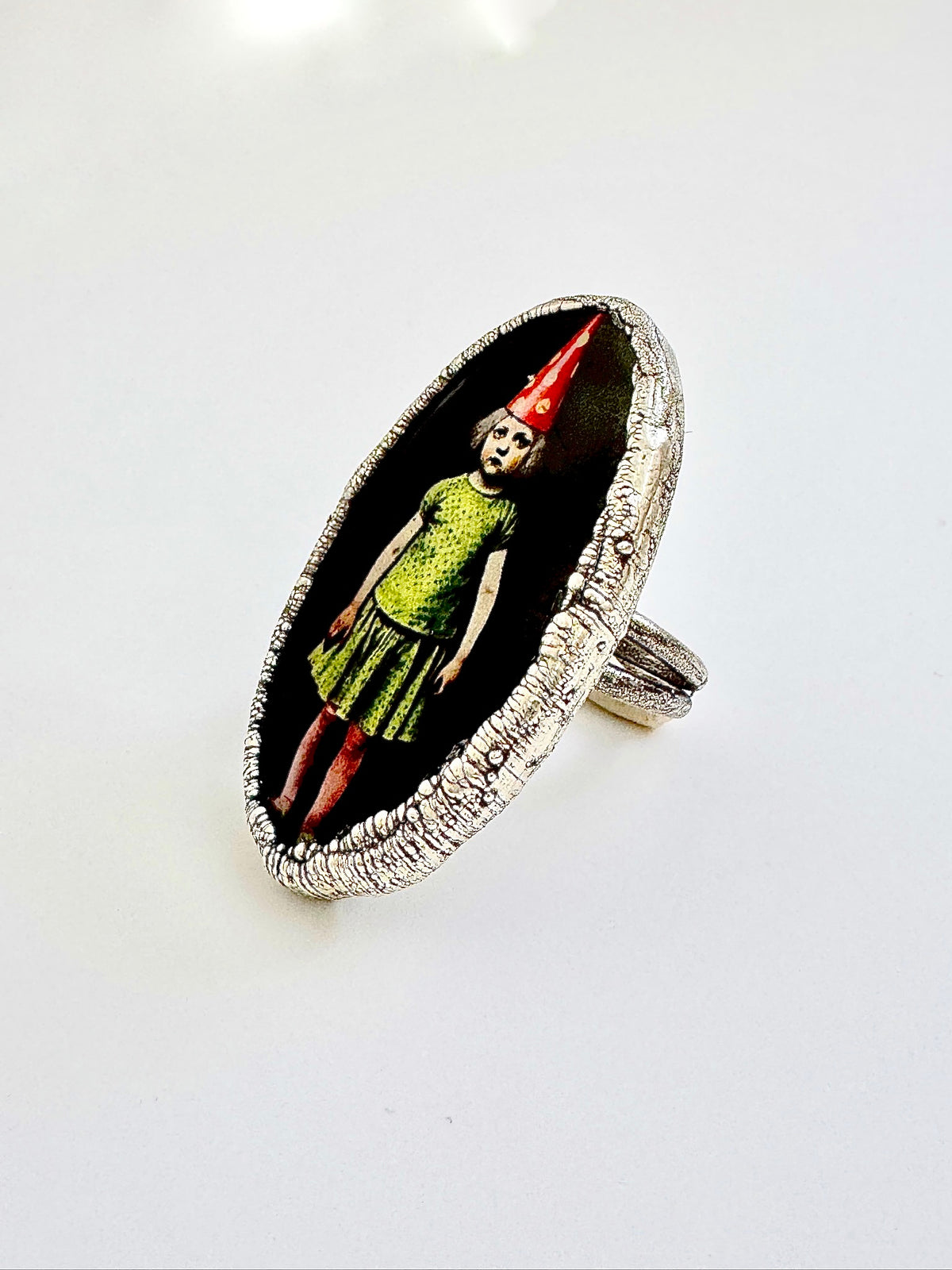 Silver Party Girl statement ring by FOXLARK from The Weirdlings Collection, size 10, with intricate design and fine silver finish.