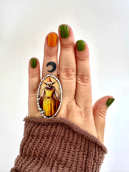 Foxtark Clown Girl statement ring in fine silver, size 7.5 from The Weirdlings Collection, featuring a detailed clown girl design.