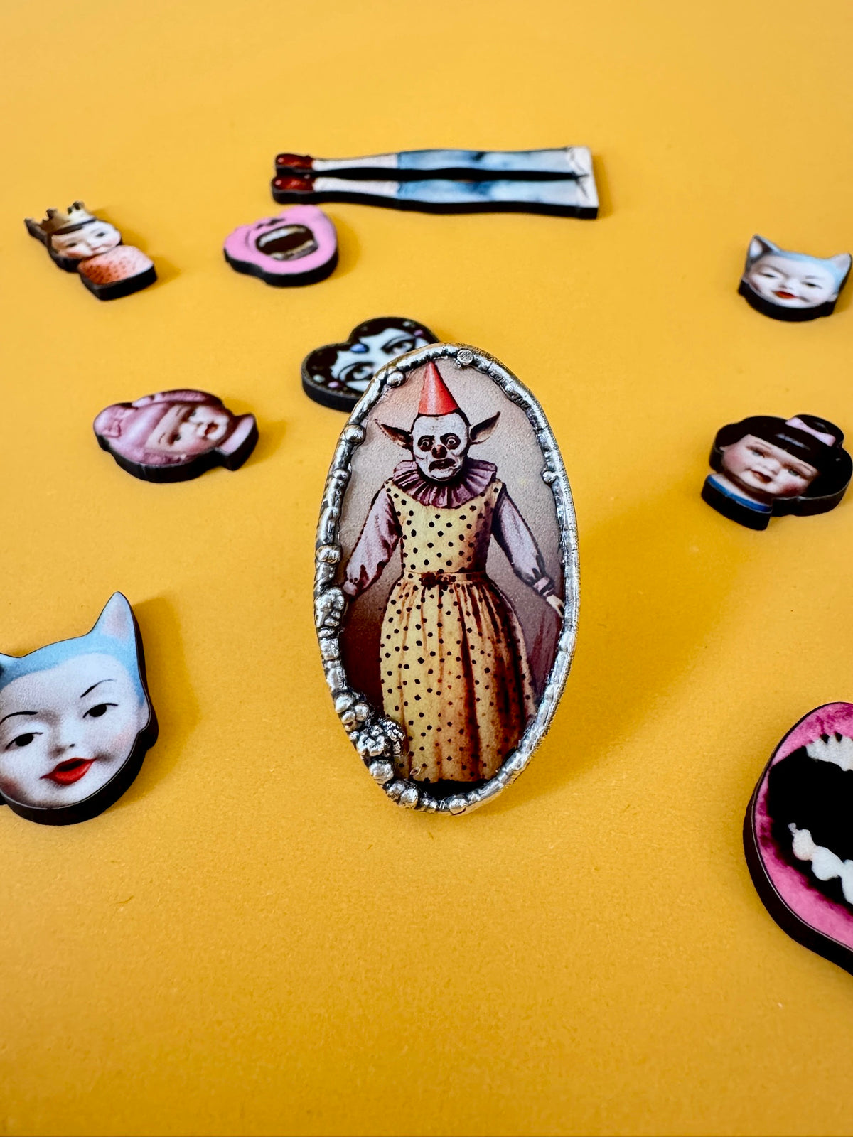 Clown Girl Statement Ring by FOXLARK in fine silver, size 7.5, featuring a detailed clown face design, from The Weirdlings Collection.
