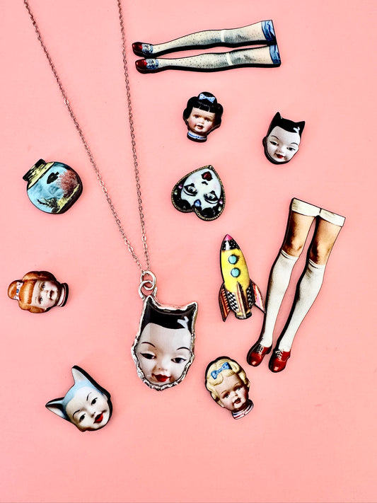 side eye doll head necklace, fine silver